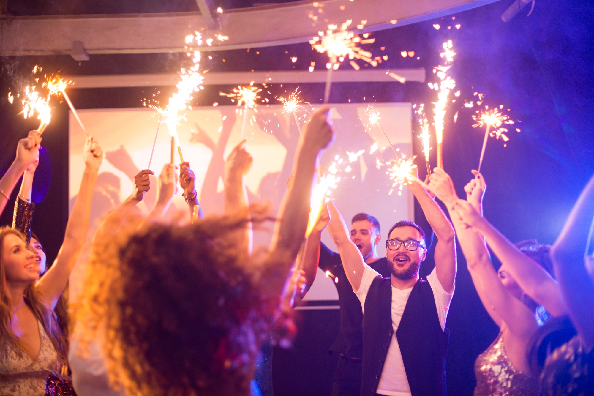 People with Sparklers Enjoying Party